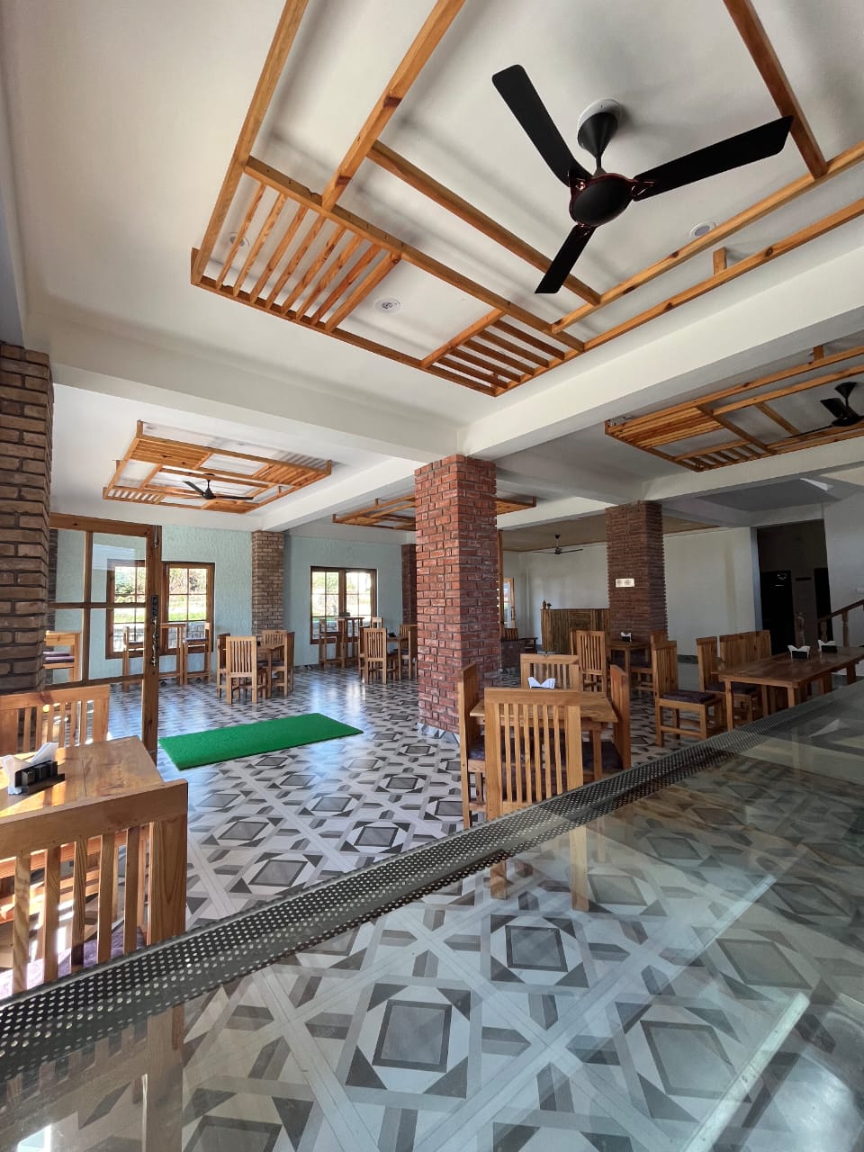 Restaurant interior at Hotel Paul Villa with wooden ceiling